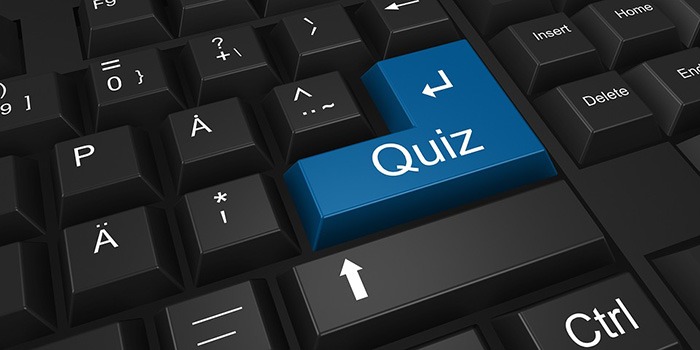 Picture of a keyboard with the word Quiz as a key an example of quiz questions