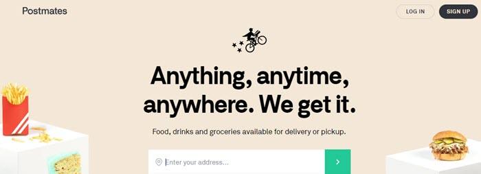 Postmates website screenshot showing white cubes with food on them (fries, cake and a burger) against a beige background.