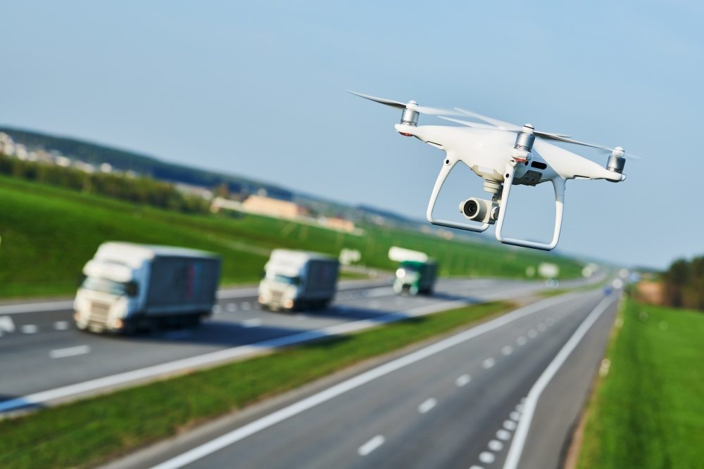 Drone performing surveillance on a highway