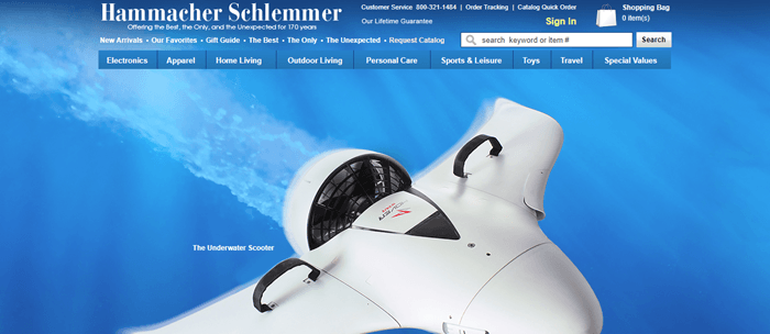 Hammacher Schlemmer网站截图，显示白色水下摩托车在清澈的蓝色海水中。