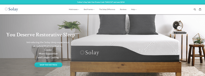 Solay Sleep网站截图，在一个漂亮的房间里放着床垫和枕头。