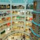 multi-story shopping mall with products being sold
