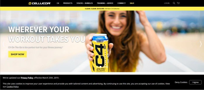 This screenshot of the home page for Cellucor has black and yellow accents and shows a photo of a woman on a beach about to drink a carbonated C4 pre-workout supplement, next to text in white lettering that introduces the supplement as C4 On The Go.