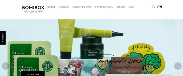 This screenshot of the home page for Bomibox has a pale blue background behind several Korean beauty product packages in greens, blues, yellows, and browns, below a white navigation bar with black text.