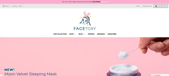 This screenshot of the home page for FaceTory has a white background, a pink and gray header, black text in the navigation bar, and a pink main section with blue text on the left side of the page and a photo of a hand scooping white face cream out of an open jar on the right side of the page.