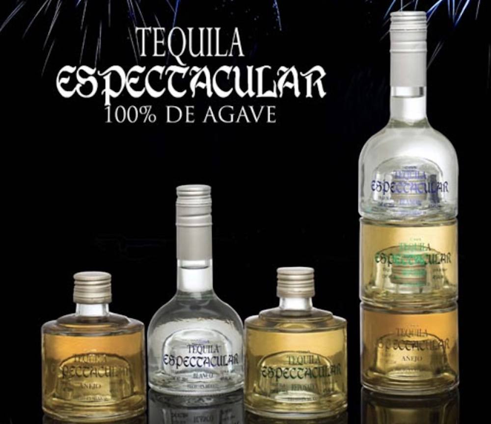 The three-component bottles of Tequila Espectacular sit to the right of the stacked bottle.